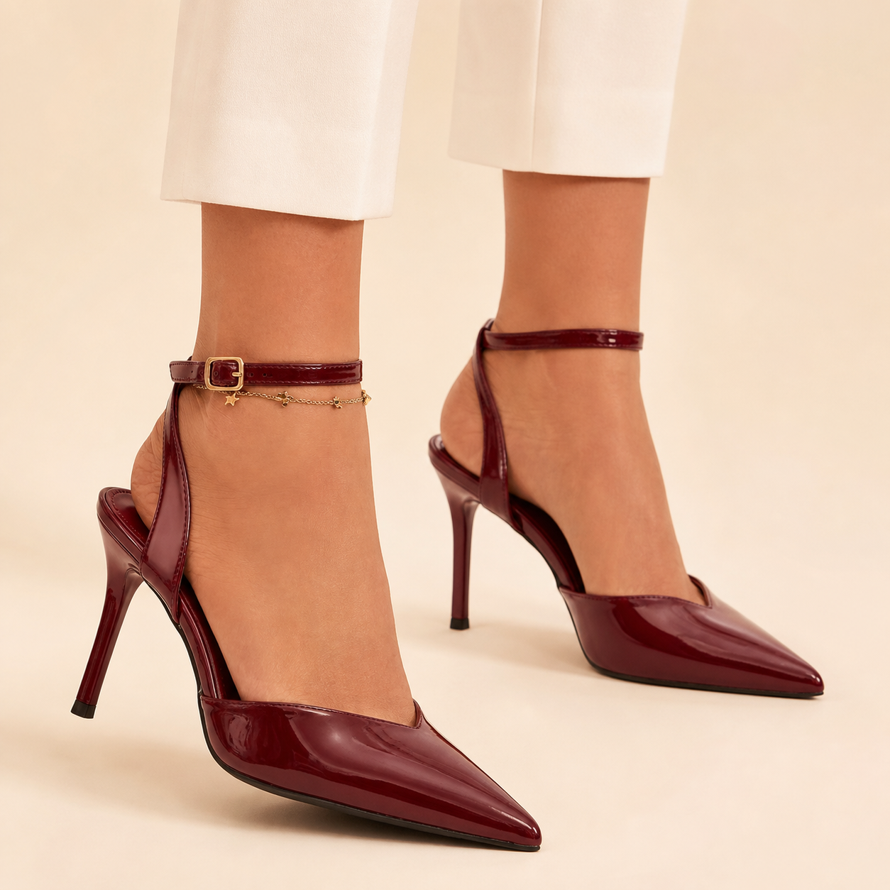 Burgundy patent pointed-toe stiletto heels with 9cm heels, front and side view